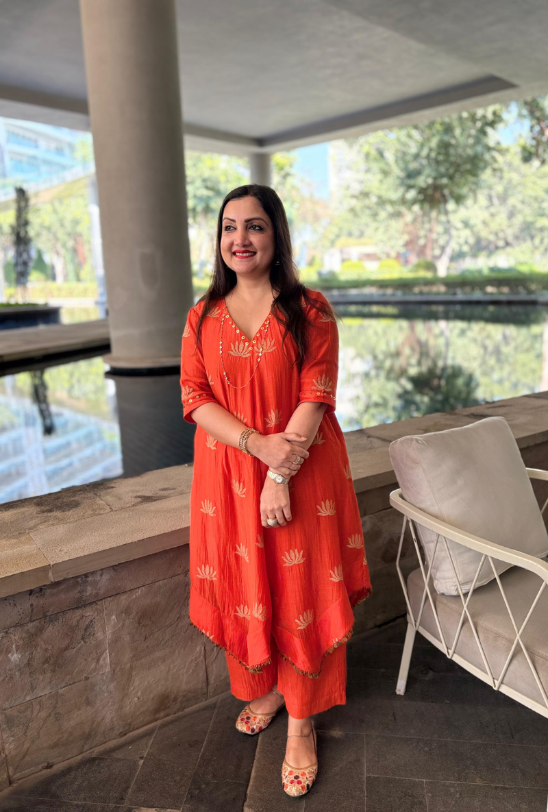 Madhuri Grover in Orange Lotus Asymmetrical Kurta Set