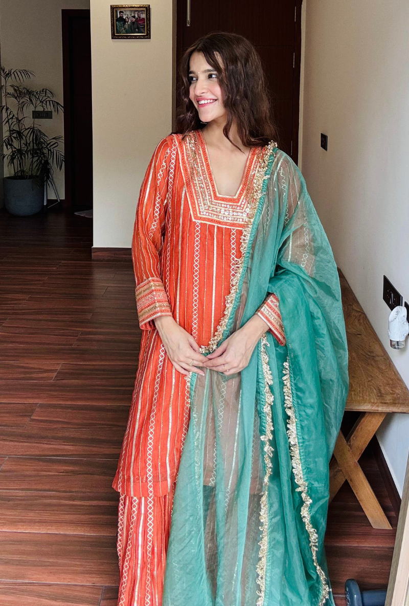 Varsha Rana in Rust Stripe Gota Gharara Set