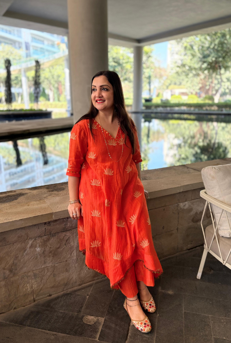 Madhuri Grover in Orange Lotus Asymmetrical Kurta Set