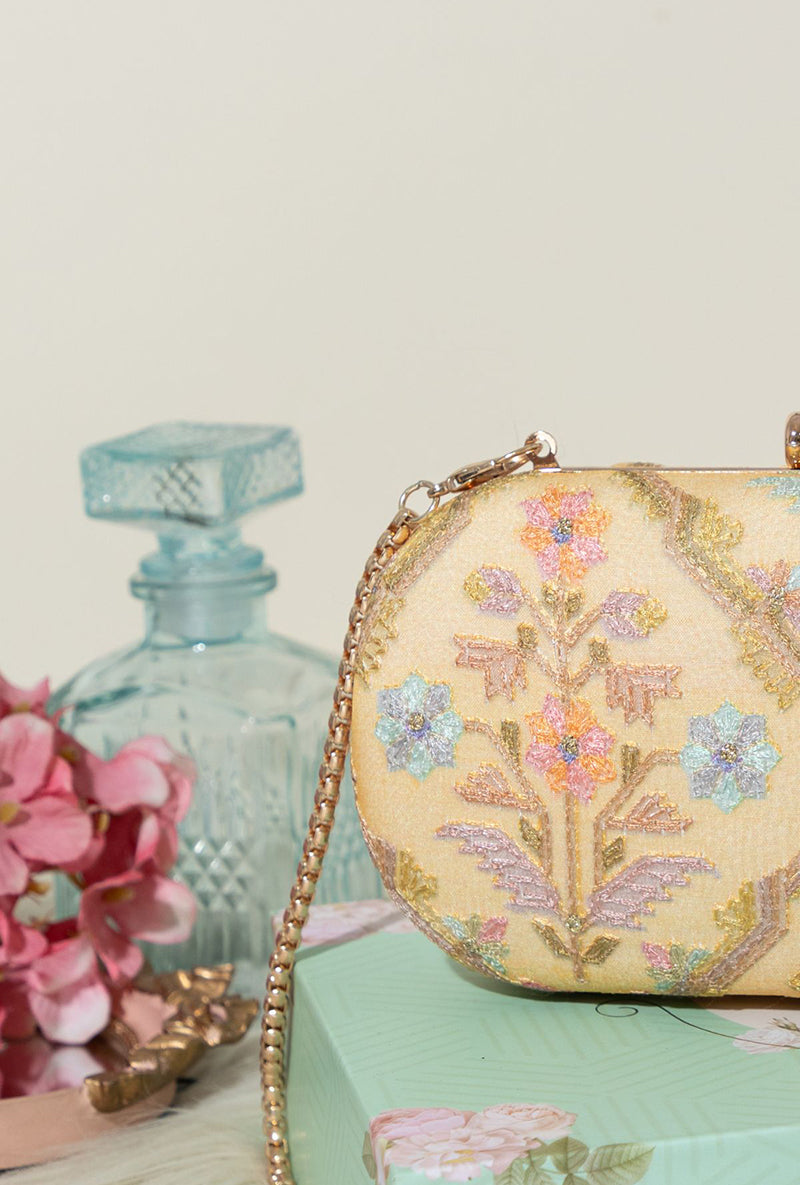 Avira Capsule Clutch- Yellow