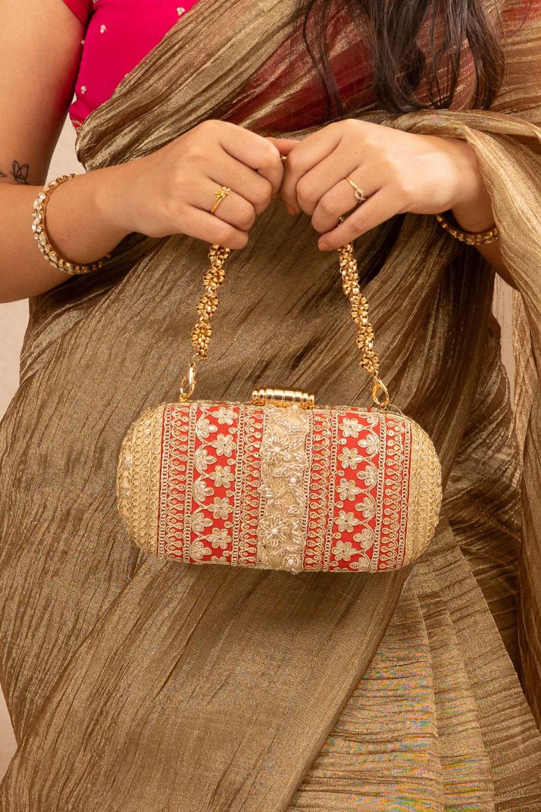 Red and Gold Naaz Capsule Clutch