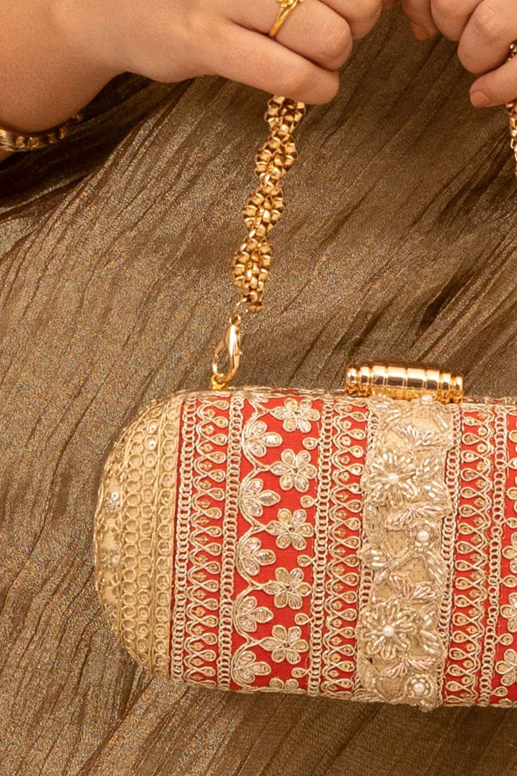 Red and Gold Naaz Capsule Clutch