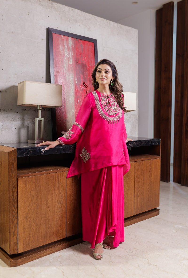 Meghna Nayyar in Rani Pink Dabka Long Yoke Drape Skirt Set