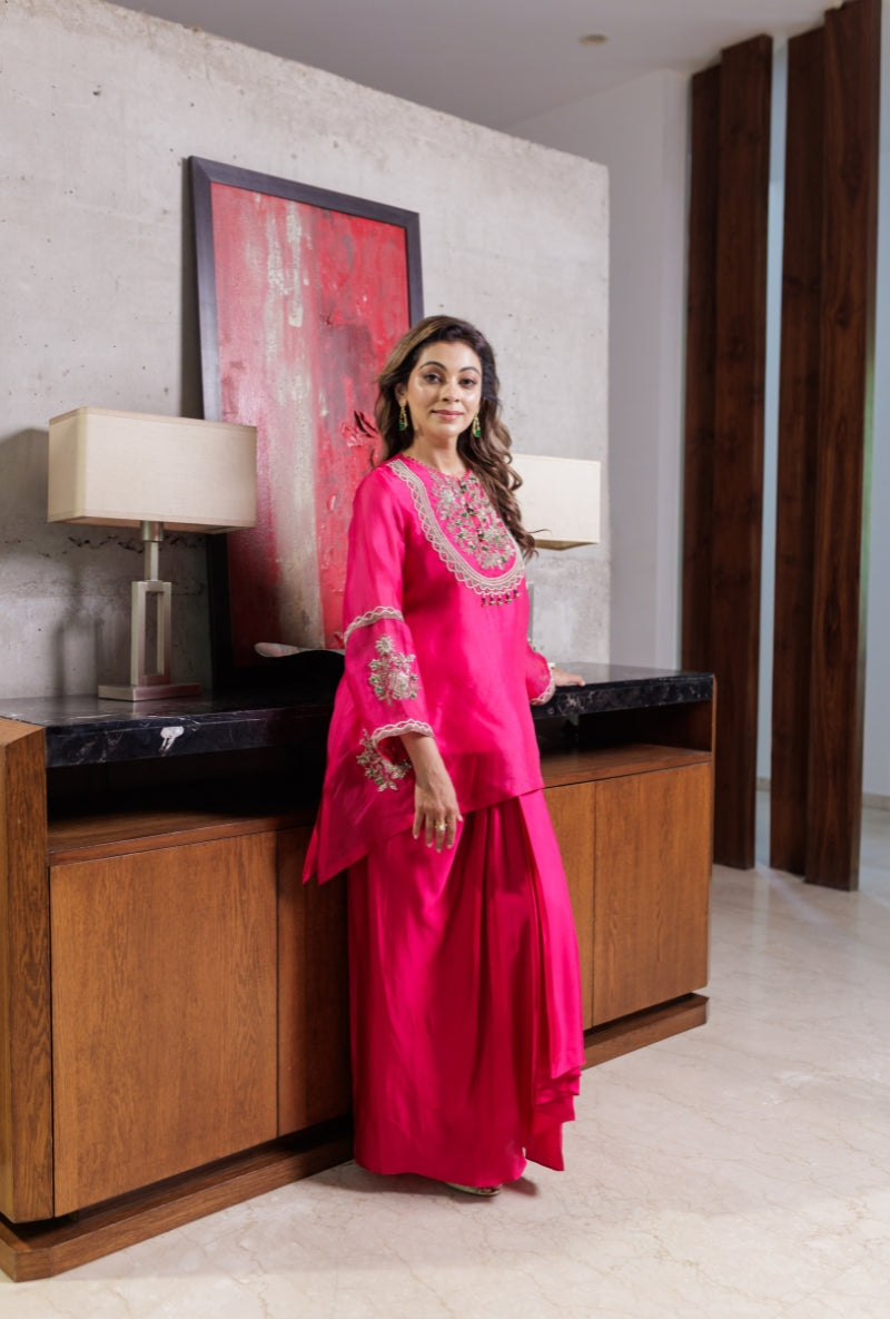 Meghna Nayyar in Rani Pink Dabka Long Yoke Drape Skirt Set