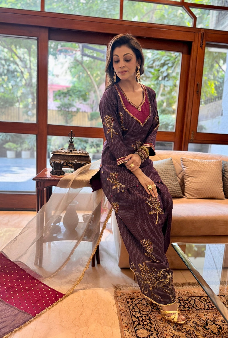 Meghna Nayyar in Purple Hand Embroidered Neck Farshi Set