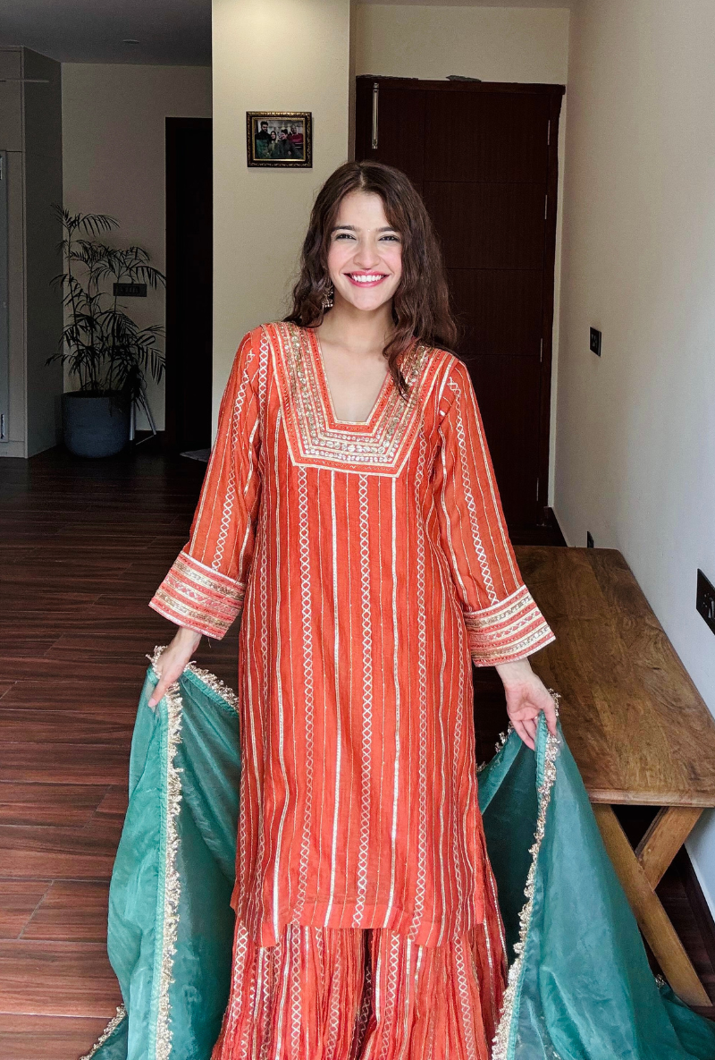 Varsha Rana in Rust Stripe Gota Gharara Set