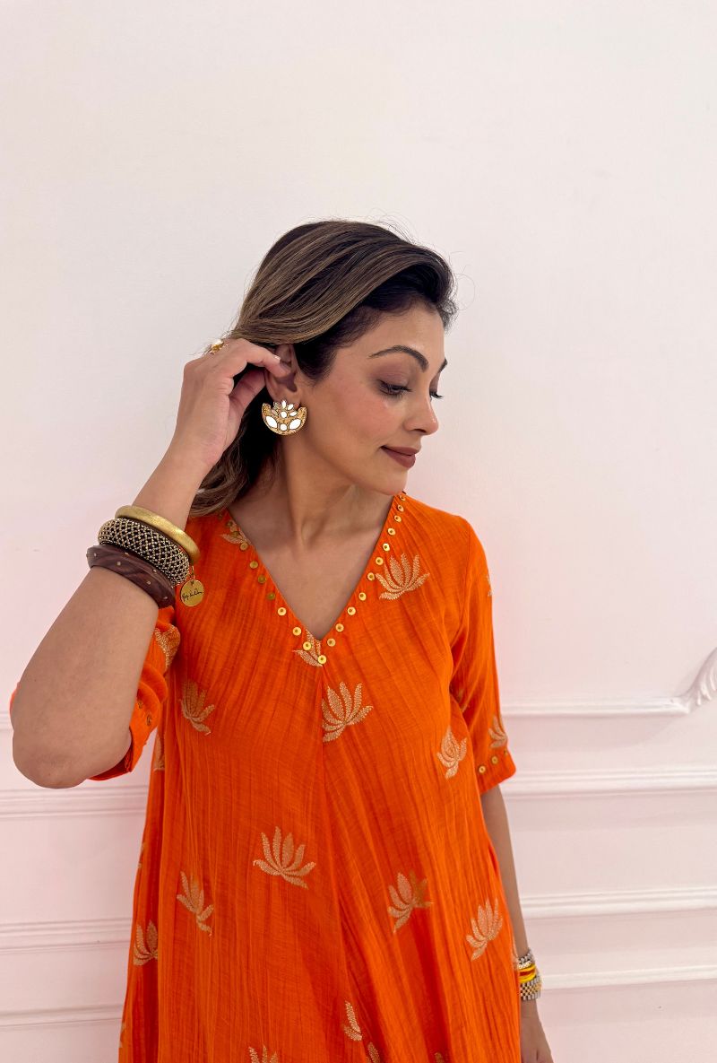 Meghna Nayyar in Orange Lotus Asymmetrical Kurta Set