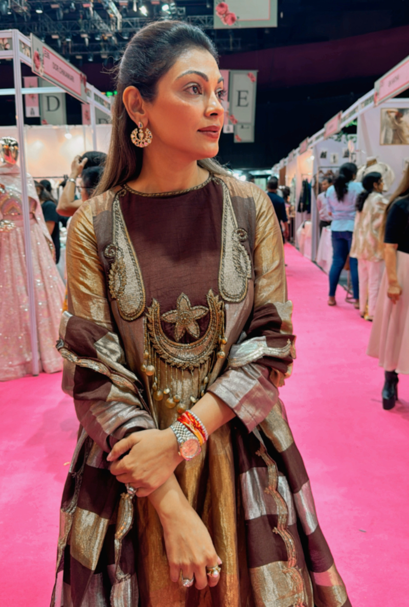 Meghna Nayyar in Brown Tissue Yoke High Low Long Kurta Set