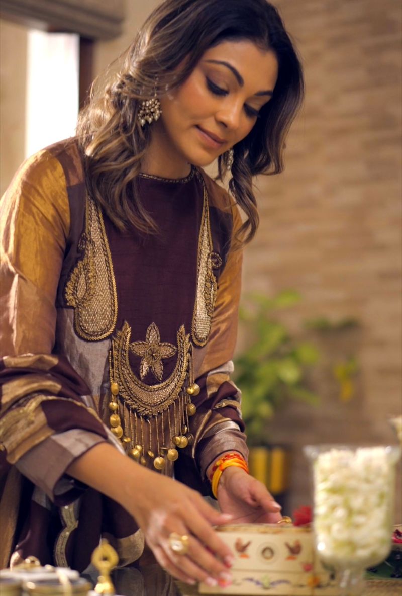 Meghna Nayyar in Brown Tissue Yoke High Low Long Kurta Set