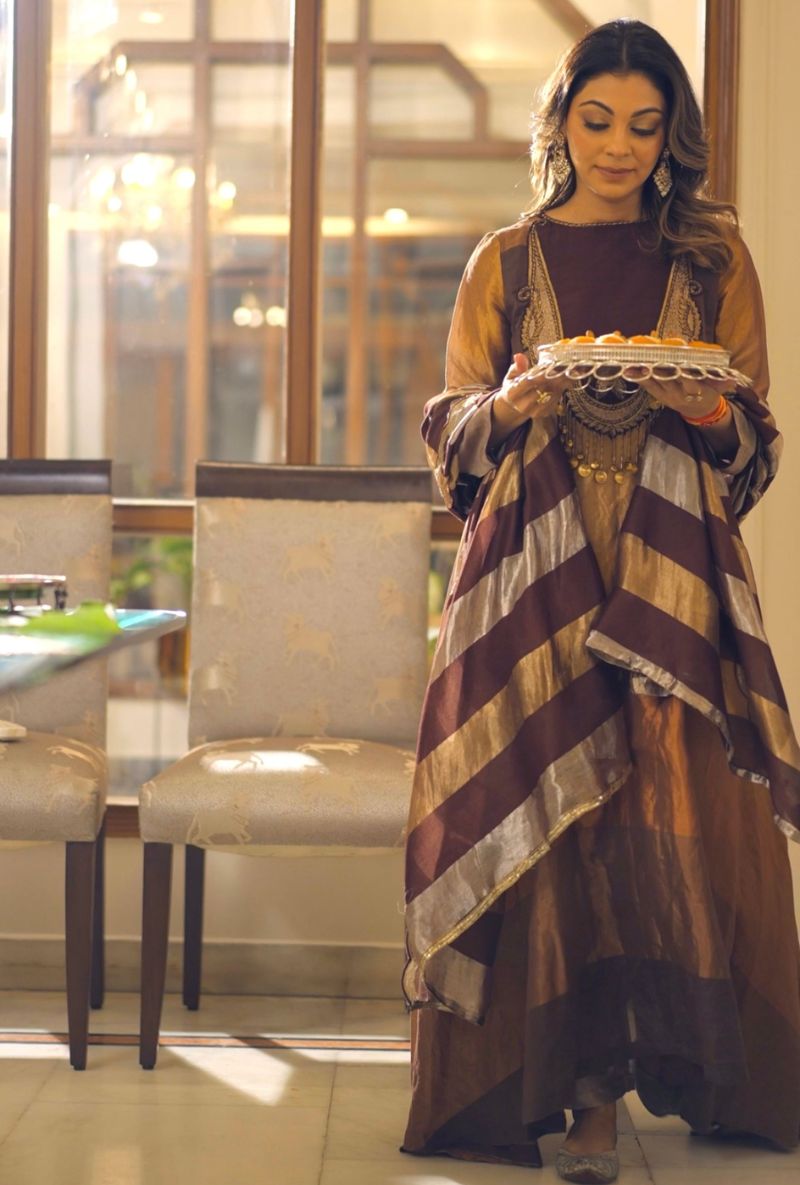Meghna Nayyar in Brown Tissue Yoke High Low Long Kurta Set