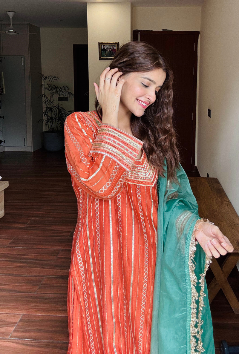 Varsha Rana in Rust Stripe Gota Gharara Set