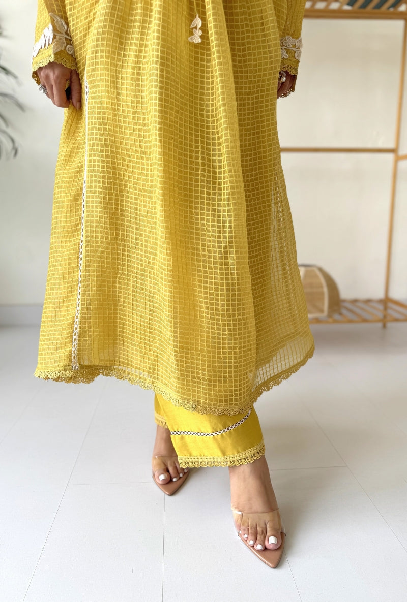 Meghna Nayyar in Yellow Tie-up Saaz Kurta Set