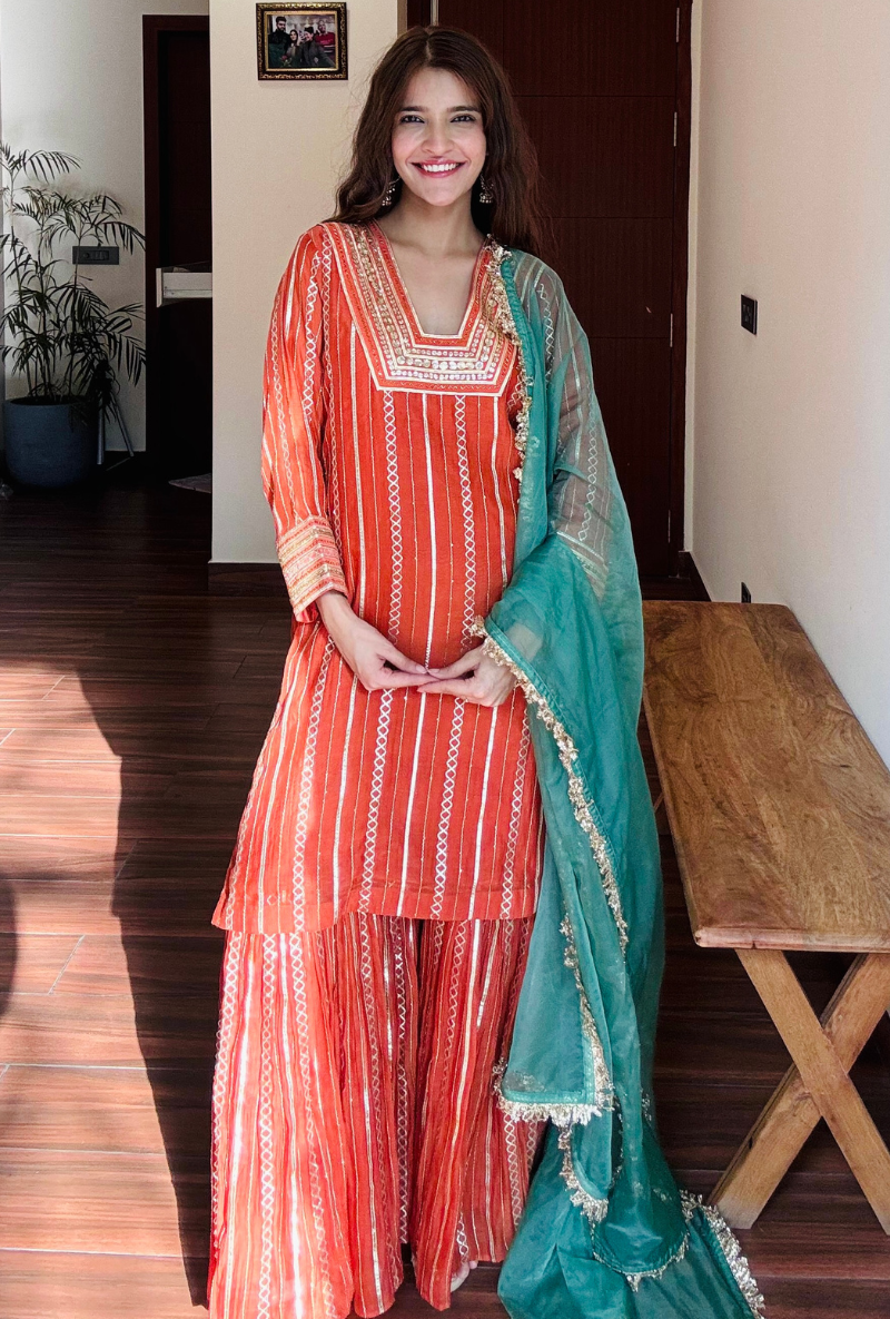 Varsha Rana in Rust Stripe Gota Gharara Set