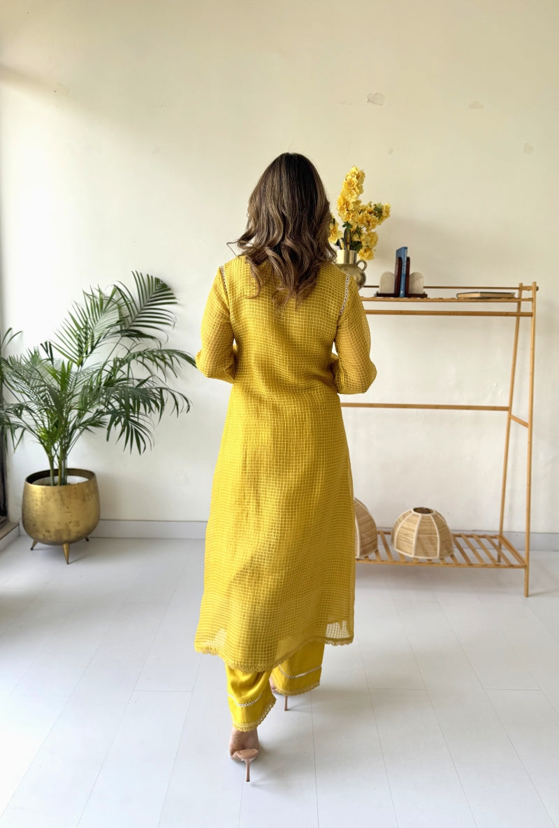 Meghna Nayyar in Yellow Tie-up Saaz Kurta Set