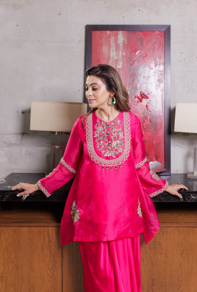 Meghna Nayyar in Rani Pink Dabka Long Yoke Drape Skirt Set