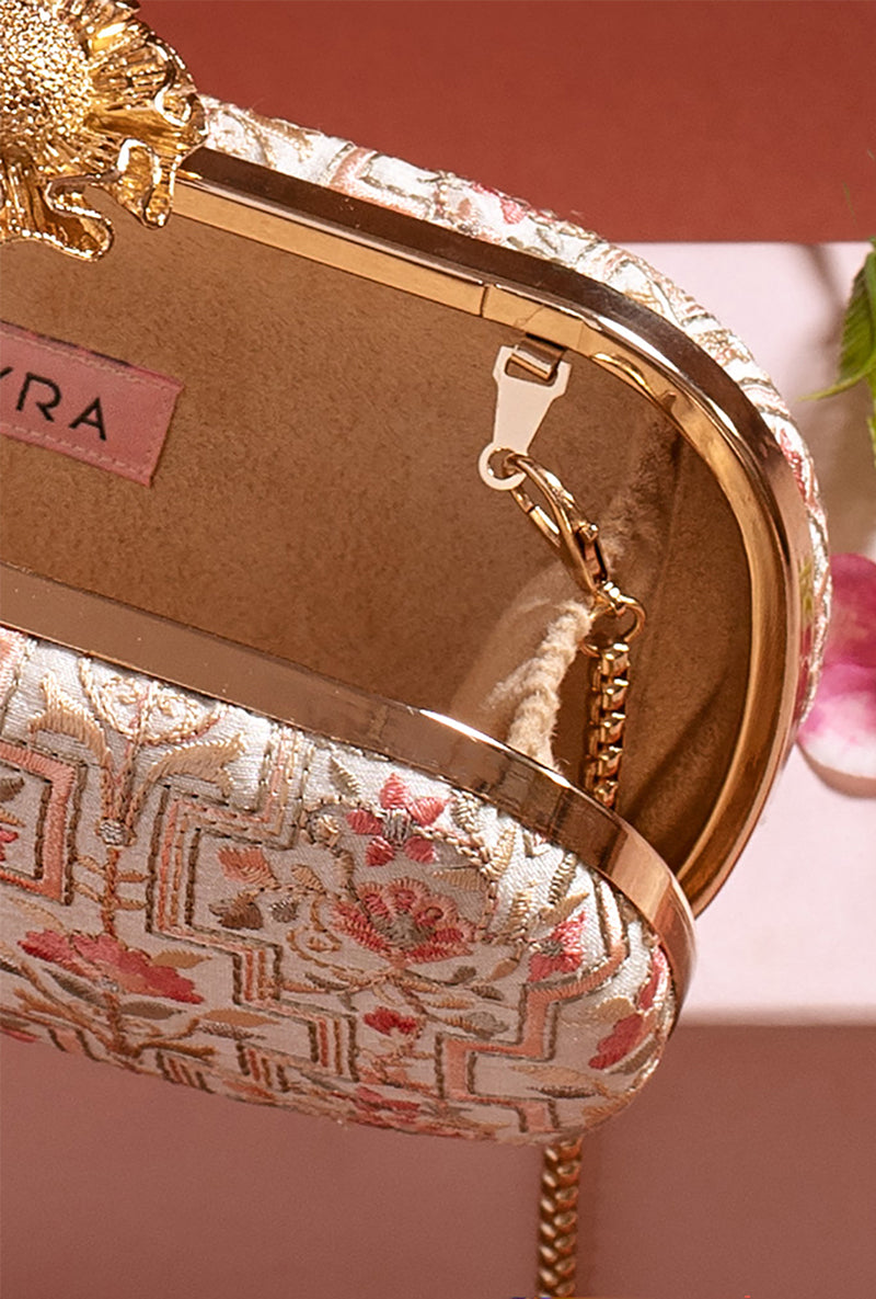 Ivory Mogra Capsule Clutch